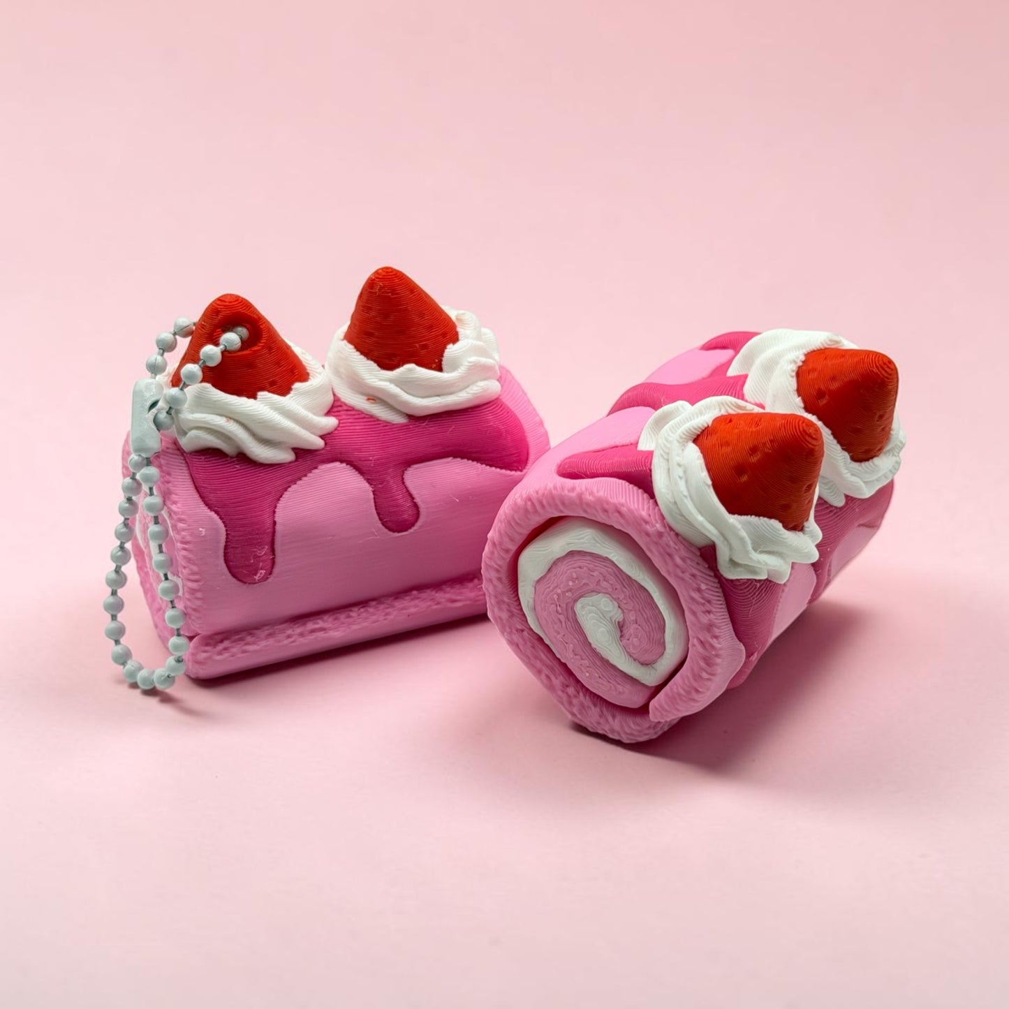 Pink Strawberry Cake Roll Fidget Clicker – Sensory Stress Relief Toy